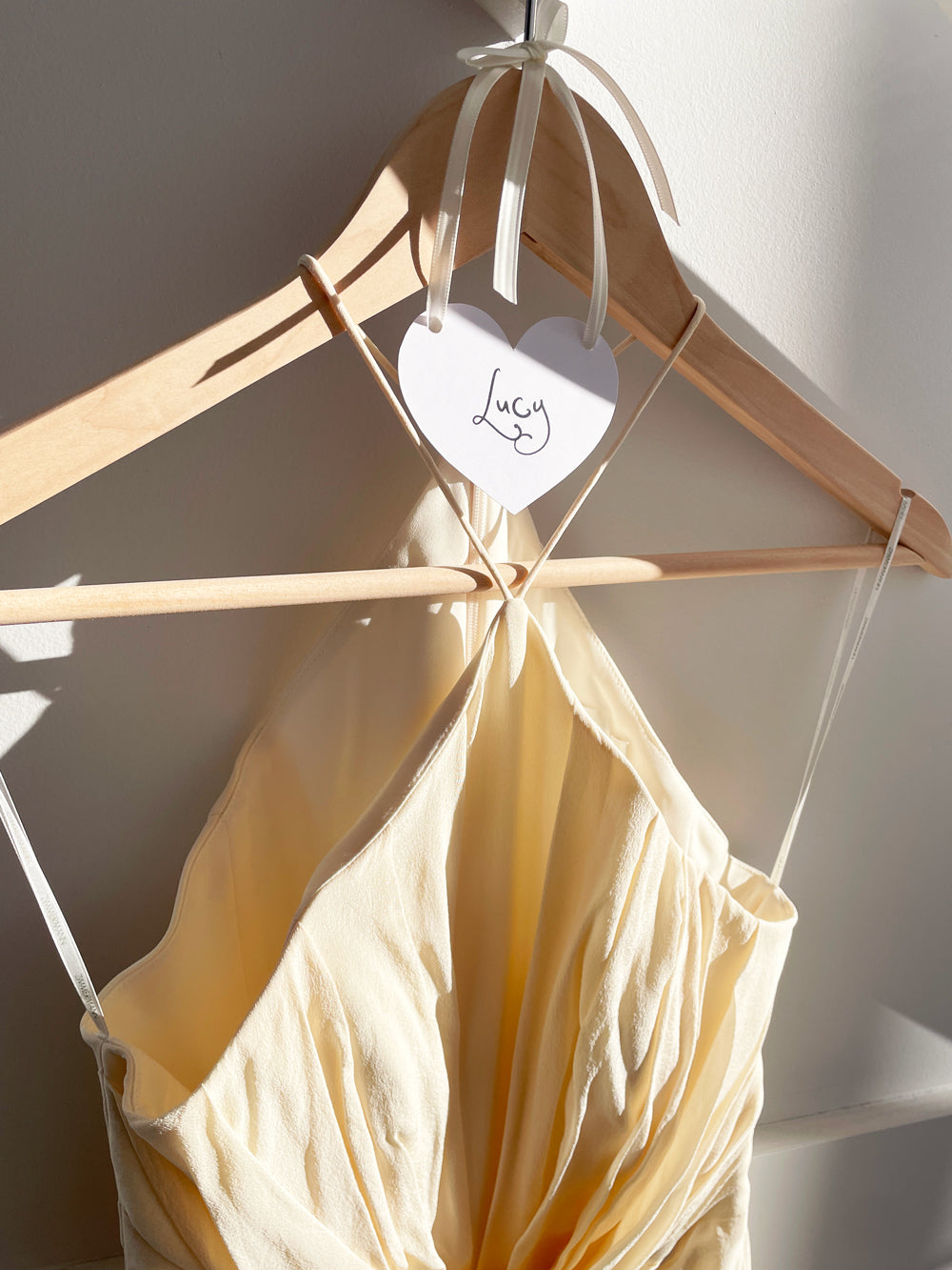 bridesmaid hanger with a personalised heart shaped tag